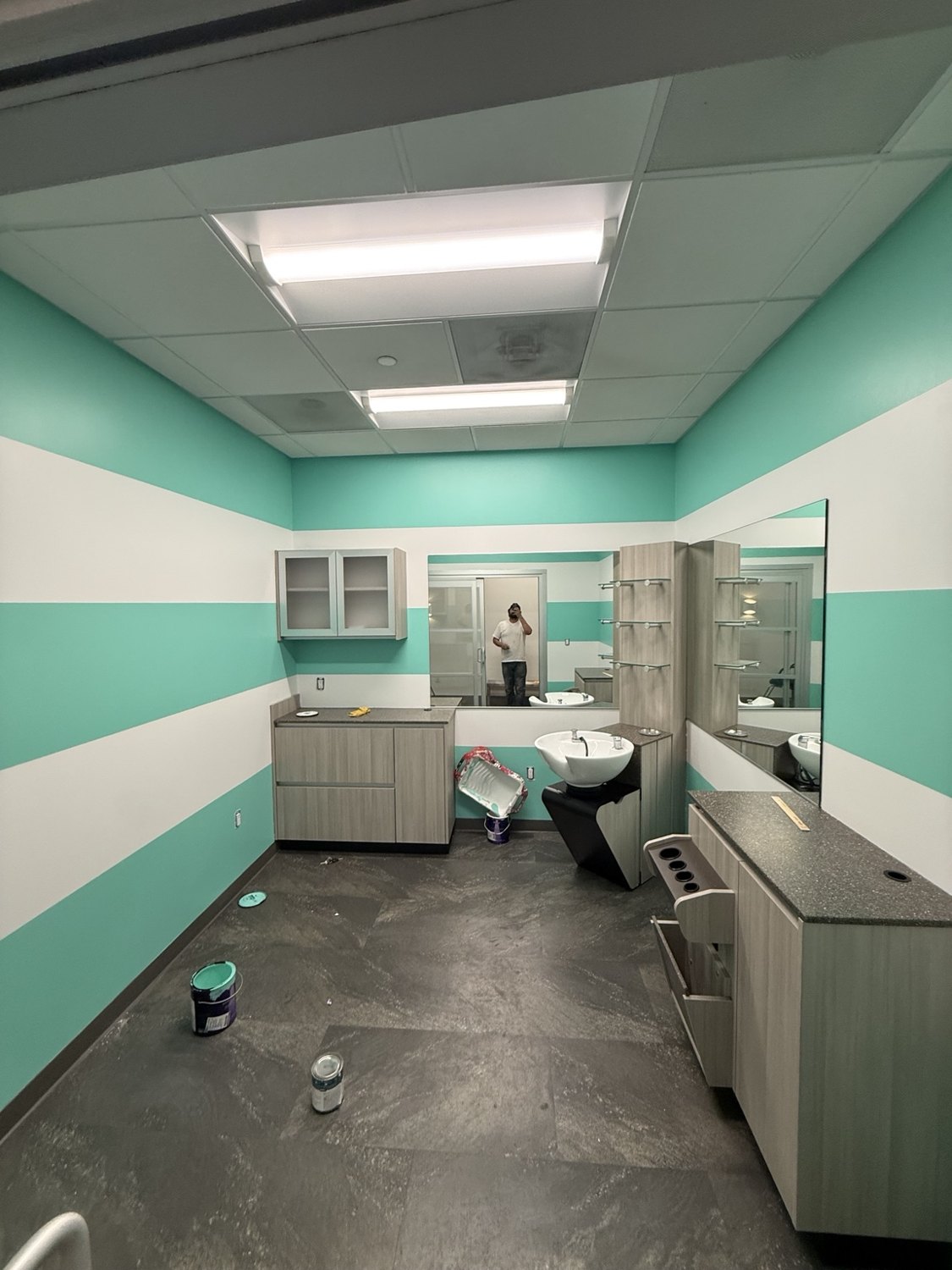 Salon suite with mint and white horizontal wall bands